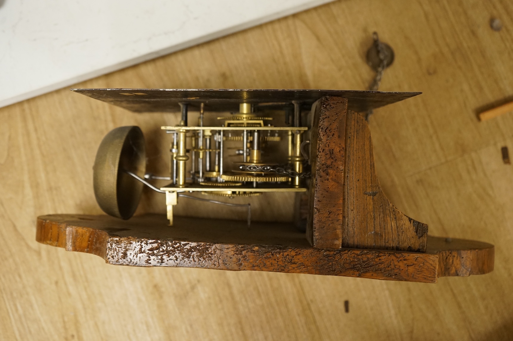 A 19th century wall clock with pendulum and weight, the floral dial inscribed Wm Ball, High Wycombe